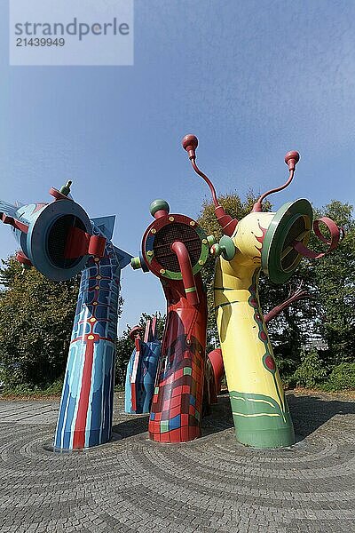 Sculpture of the Nessy family in bright colours  sea monster  aeration structure for Düsseldorf's urban drainage system  Düsseldorf  North Rhine-Westphalia  Germany  Europe