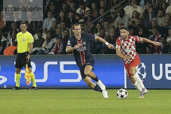 Football match  Miguel GUTIERREZ Girona FC right on the ball in a duel with Fabian RUIZ Paris St. Germain  Parc des Princes football stadium  Paris