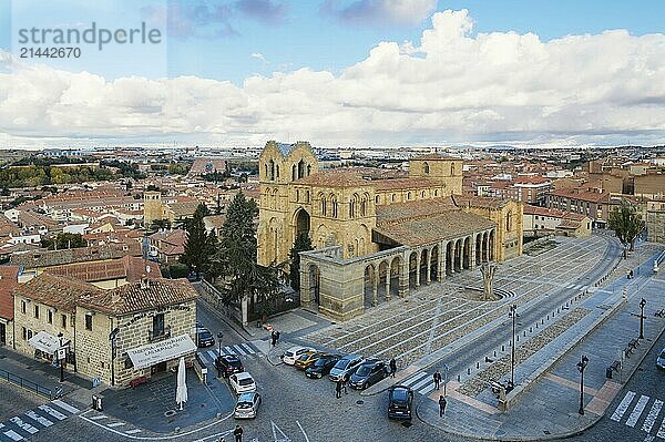 Avila  Spain  November 11  2014: Church of San Vicente from Medieval Walls a cloudy day. The old city and its extramural churches were declared a World Heritage site by UNESCO  Europe