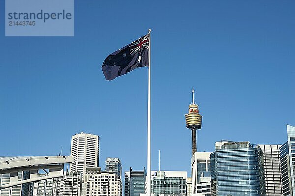 20.09.2018  Sydney  New South Wales  Australia  A giant Australian flag flies over Darling Harbour with the skyline of Sydney's business district and Sydney Tower in the background  Oceania