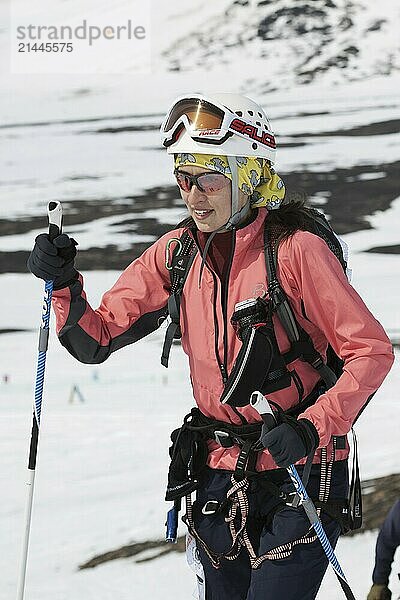 AVACHA VOLCANO  KAMCHATKA PENINSULA  RUSSIAN FEDERATION  APRIL 21  2012: Portrait of young woman equipped ski mountaineer  participating in Open Cup of Russia on Ski Mountaineering on Kamchatka