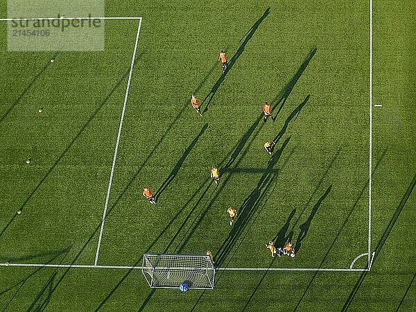 Young boys plays football - view from above