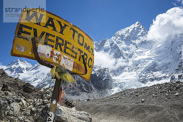 A sign points the way to Mount Everest Base Camp  a popular trekking destination in Nepal's Khumbu region.