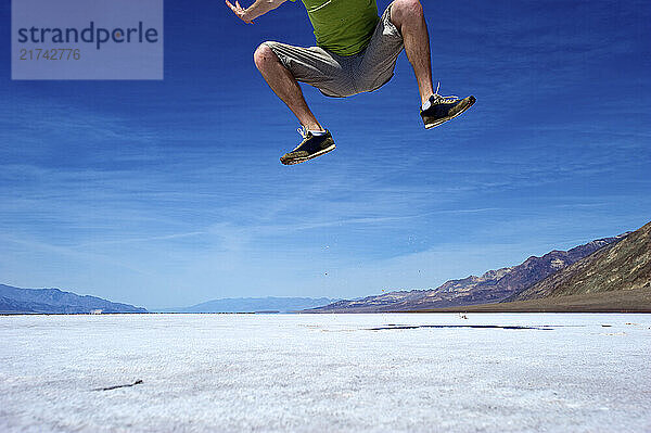 David Zentz leaps out of frame over salt flats in Death Valley National Park  Calif.  on March 16  2010.