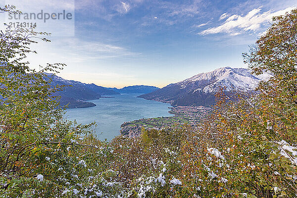 Colorful trees on hills frame Gravedona and Lake Como  Bodone  Como province  Lombardy  Italy