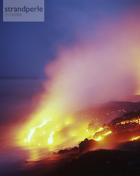 Lava river falling into the Pacific Ocean in Hawaii Volcanoes National Park