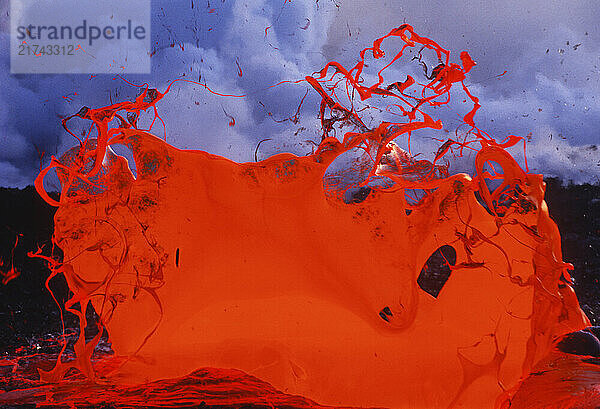 Lava burst forming an abstract colorful composition