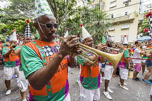 Carnival street parade of typical 'bloco' Gigantes da Lira in Laranjeiras neighborhood  Rio de Janeiro  Brazil