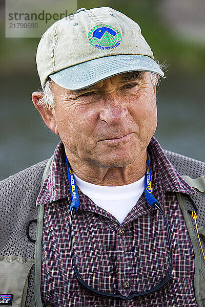 Legendary philanthropist  environmentalist and phenomenal businessman known for his outdoor pursuits and adventures awaits a day of flyfishing on the Fall River in Idaho.