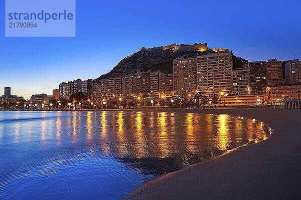 Alicante skyline at sunset from Postiguet beach in spain