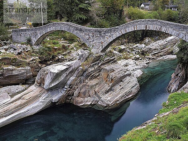 Historic Ponte dei Salti with double arches  Roman bridge  over the Verzasca river  Verzasca Valley  Lavertezzo  Canton Ticino  Switzerland  Europe