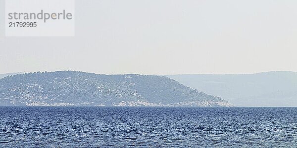 Sea and mountain range. Summer seascape horizon