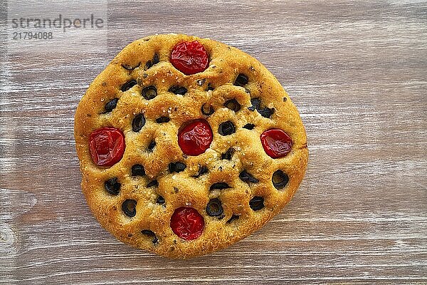 Mediterranean bread with tomatoes and olives black