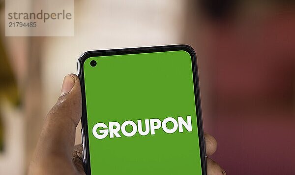 Dhaka  Bangladesh- 19 Nov 2024: Groupon logo is displayed on smartphone. Groupon Inc is an American global e-commerce marketplace.