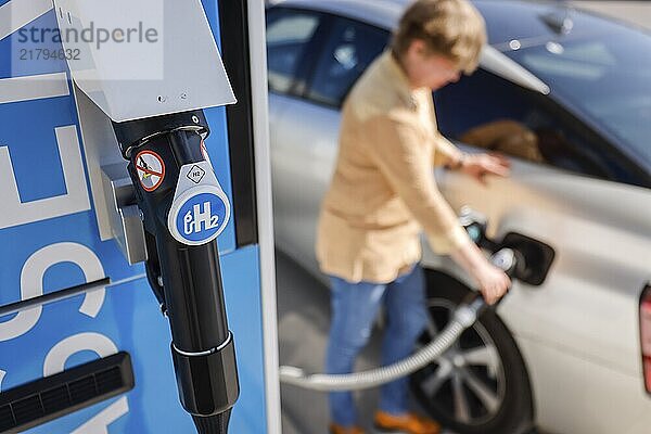 Herten  North Rhine-Westphalia  Germany - Hydrogen car fills up with H2 hydrogen at an H2 hydrogen filling station  press event at the H2 filling station at the h2herten user centre  Hydrogen Competence Centre Herten on the site of the disused Ewald mine in Herten