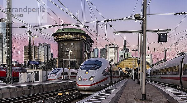 Frankfurt main station with ICE in the evening  sunset. View of platform and banking district  skyline of Frankfurt am Main  Hesse  Germany  Europe