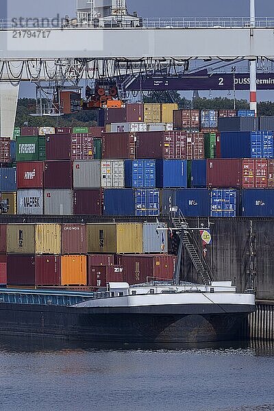 Ships with containers in Duisburg harbour  Rhine  Duisburg  North Rhine-Westphalia  Germany  Europe