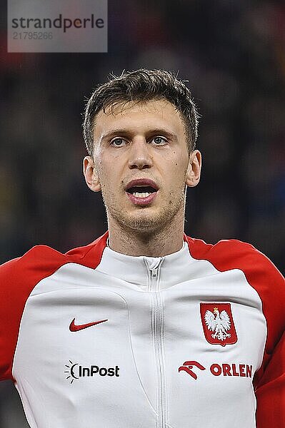 PRAGUE  CZECH REPUBLIC - MARCH 24  2023: Qualifications for UEFA Euro 2024. Match Czech Republic - Poland 3:1. Krystian Bielik during anthem.