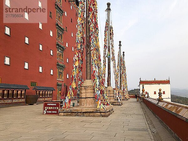 Buddhist color prayer flags at The Putuo Zongcheng Buddhist Temple  one of the Eight Outer Temples of Chengde  built in 1767 and modeled after the Potala Palace of Tibet. Chengde  China  Asia