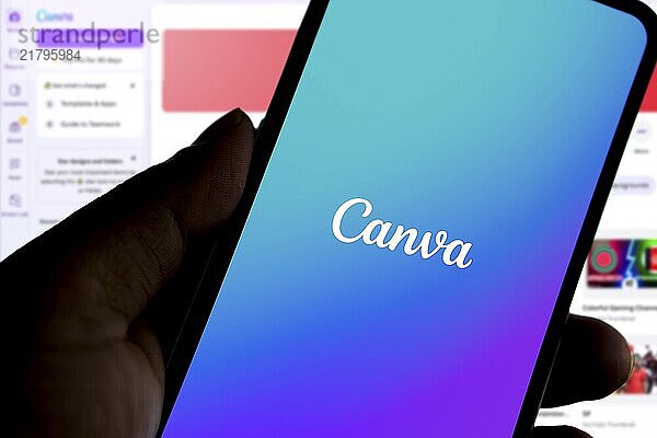 Smartphone with Canva logo  is a simplified graphic design tools software and website-Dhaka  Bangladesh 24 Nov 2024.