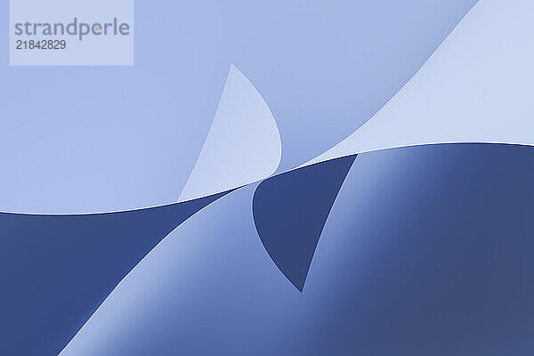 Flowing waves in varying shades of blue create a serene abstract visual