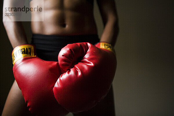 A woman poses in athletic gear in Oceanside  California.