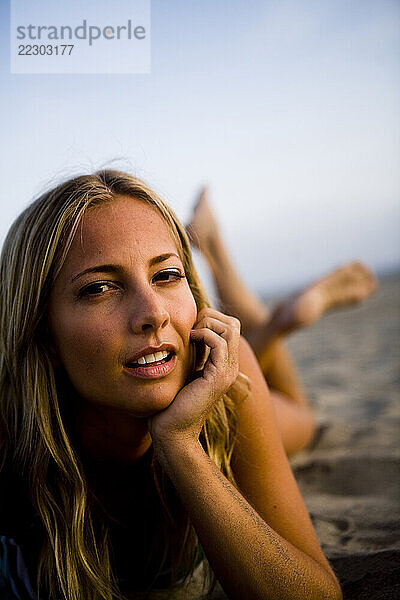 Close up portrait of a women on the beach.